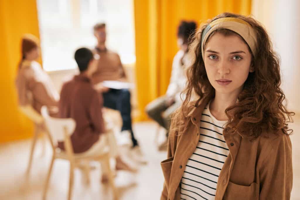 Young Woman at Group Therapy Session